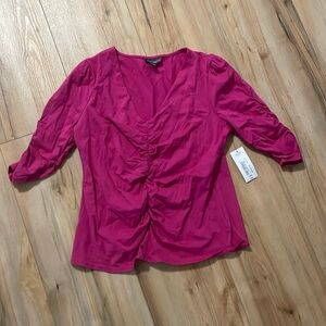 Blouse fuschia color size large. New with tag